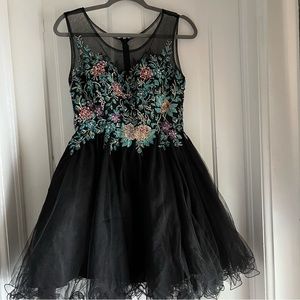 Knee length black formal dress with beading blue purple gold floral embroidery